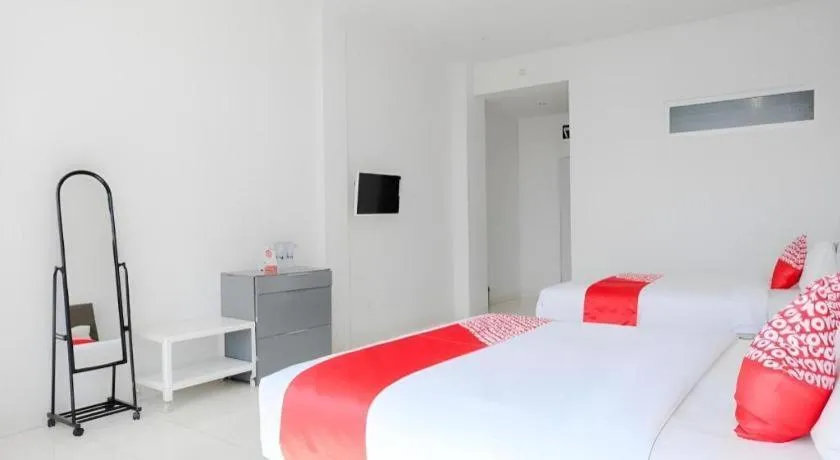 Bed in OYO 1194 Villa Bukit Panderman Residence