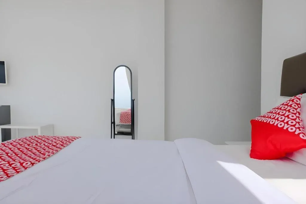 Bed in OYO 1194 Villa Bukit Panderman Residence