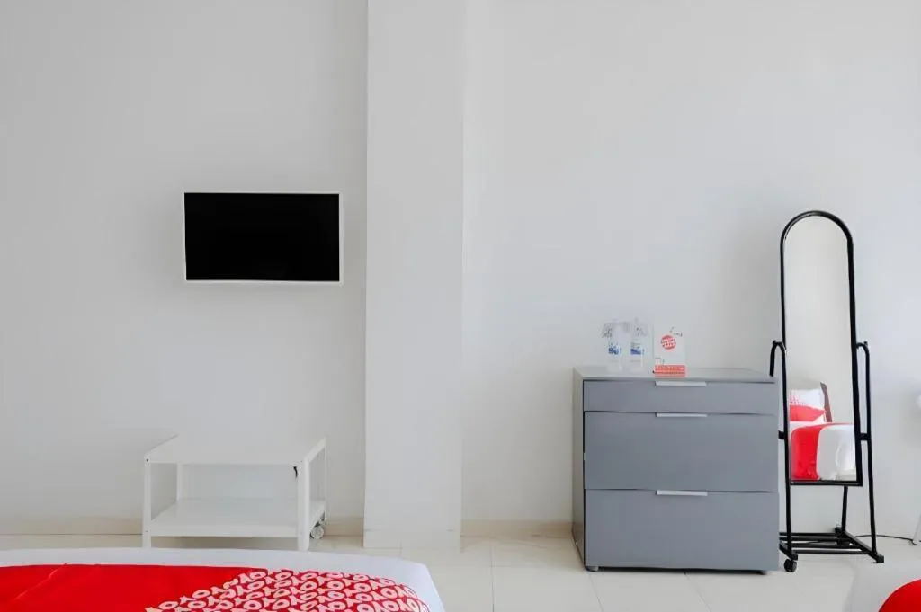 Bed in OYO 1194 Villa Bukit Panderman Residence