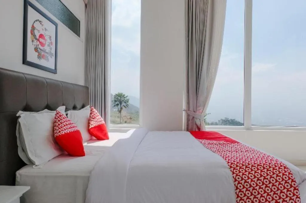 Bed in OYO 1194 Villa Bukit Panderman Residence
