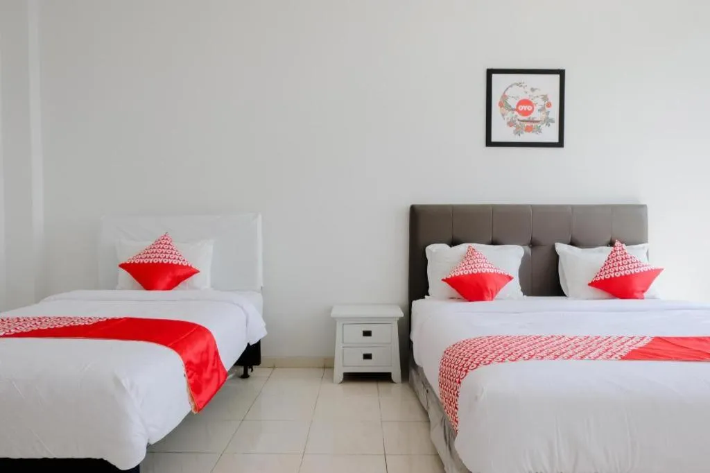 Bed in OYO 1194 Villa Bukit Panderman Residence