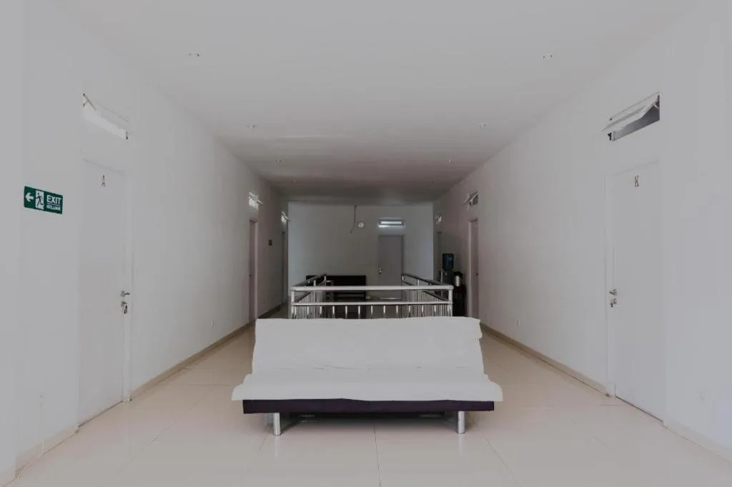 Bed in OYO 1194 Villa Bukit Panderman Residence