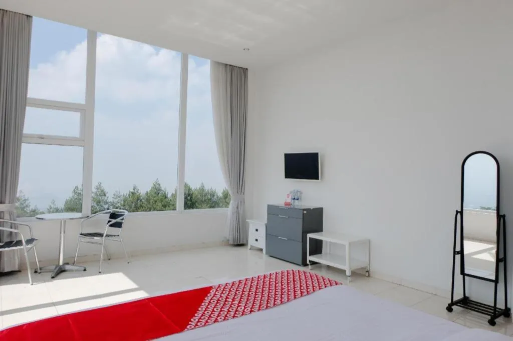 Bed in OYO 1194 Villa Bukit Panderman Residence