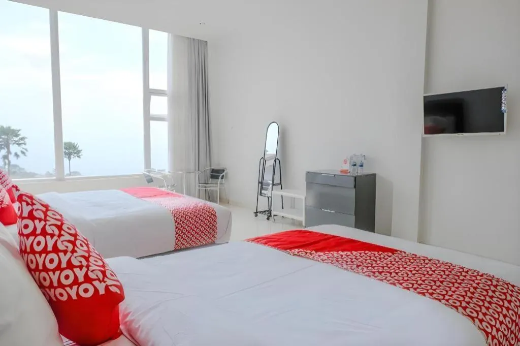Bed in OYO 1194 Villa Bukit Panderman Residence