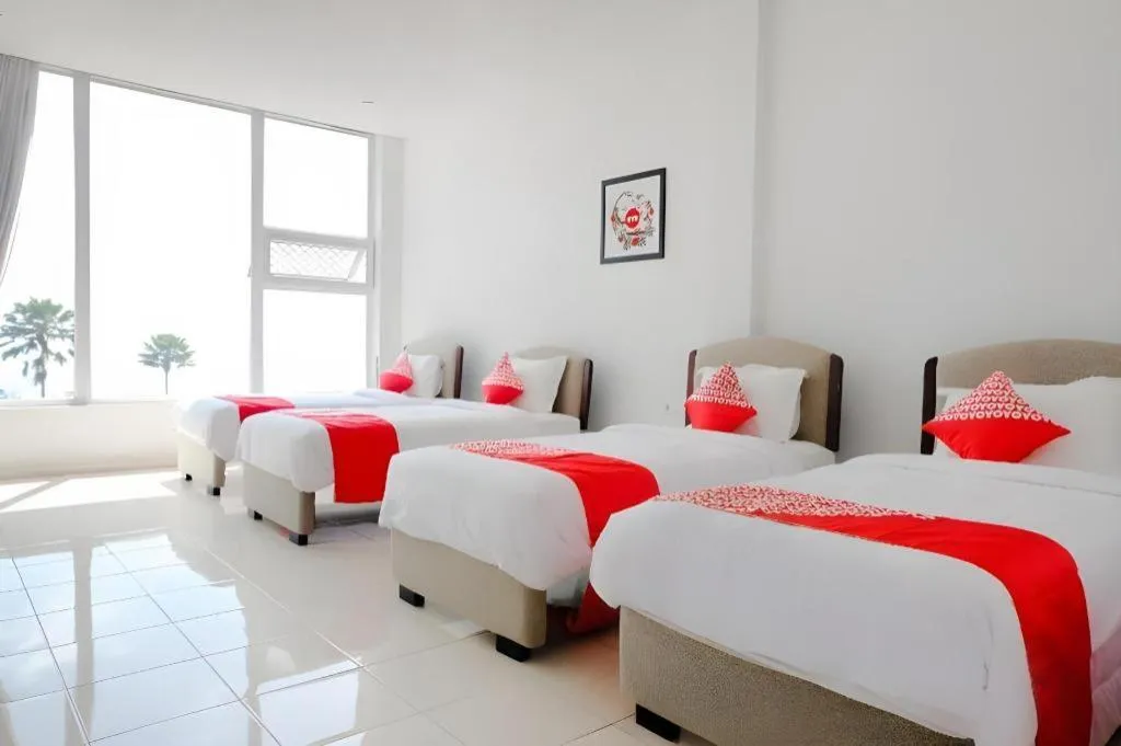 Bed in OYO 1194 Villa Bukit Panderman Residence