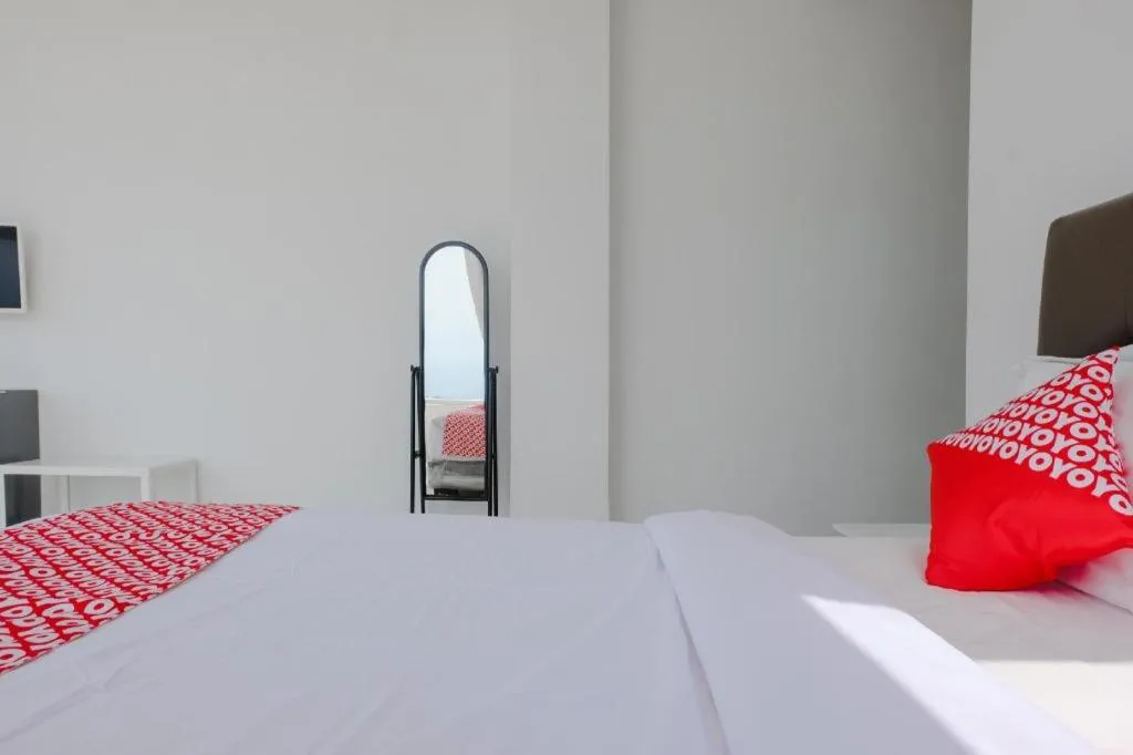 Bed in OYO 1194 Villa Bukit Panderman Residence