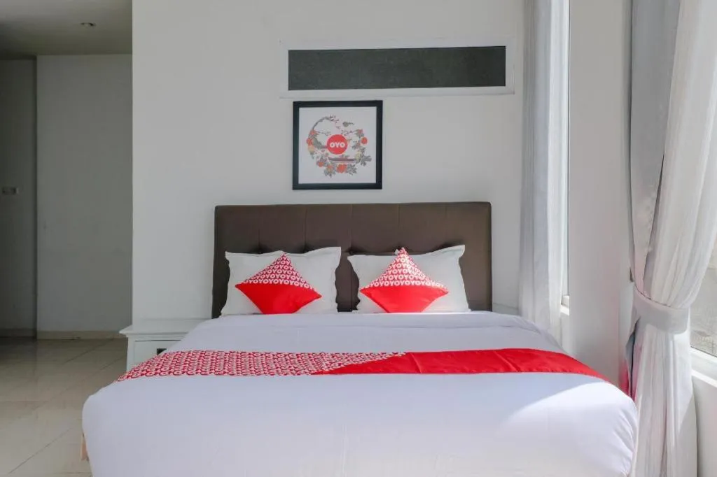 Bed in OYO 1194 Villa Bukit Panderman Residence