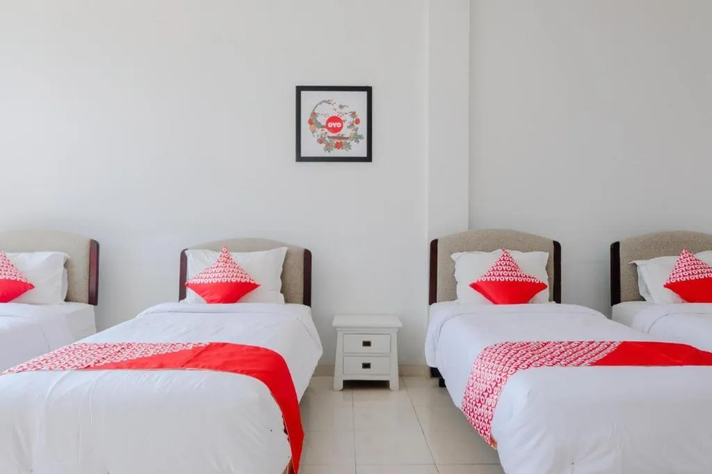 Bed in OYO 1194 Villa Bukit Panderman Residence