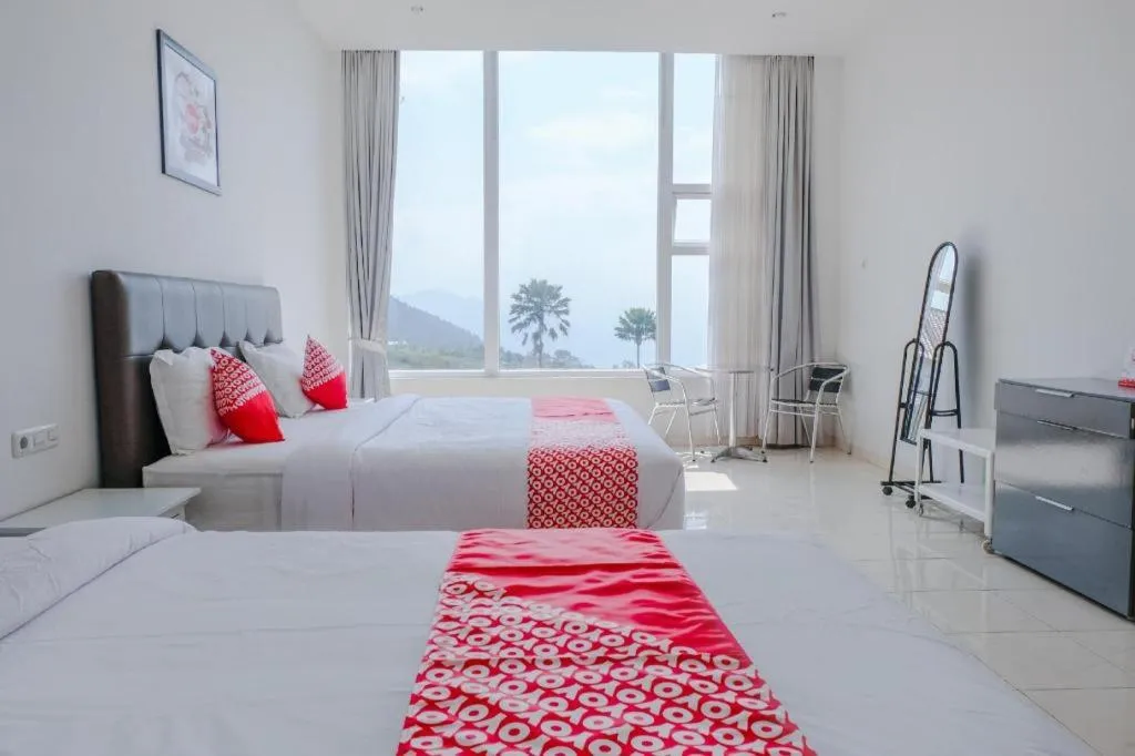 Bed in OYO 1194 Villa Bukit Panderman Residence