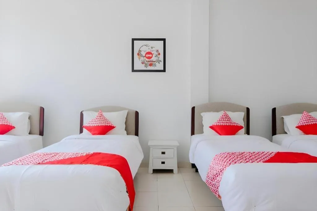 Bed in OYO 1194 Villa Bukit Panderman Residence