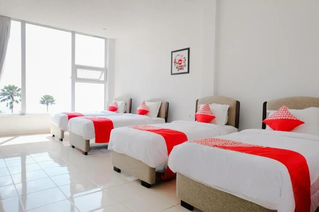 Bed in OYO 1194 Villa Bukit Panderman Residence