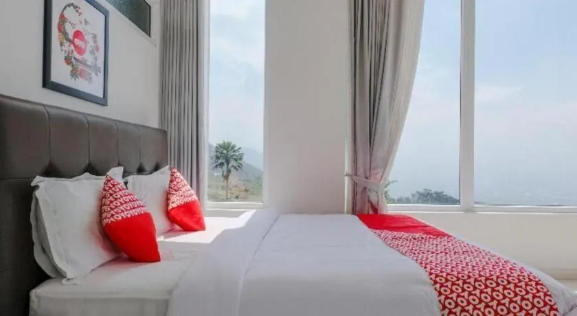 Bed in OYO 1194 Villa Bukit Panderman Residence