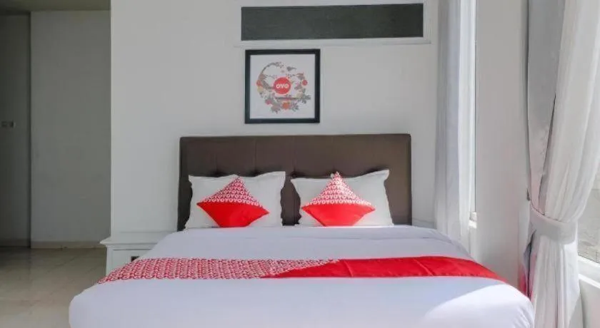 Bed in OYO 1194 Villa Bukit Panderman Residence