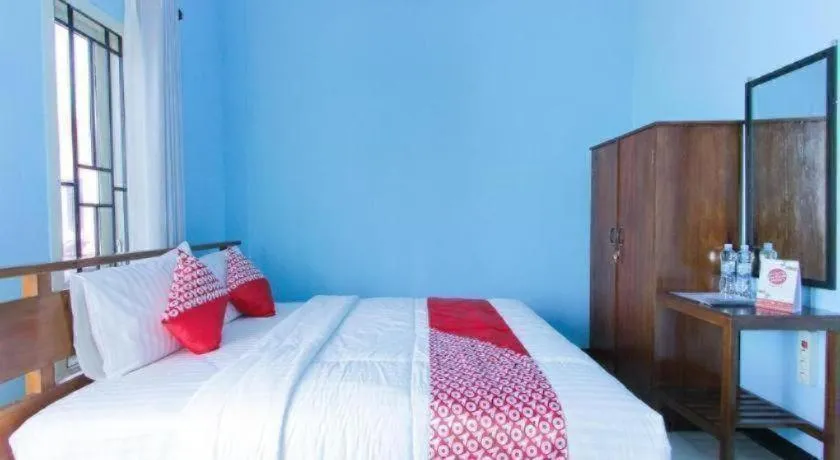 Bed in Hotel O Asipra House