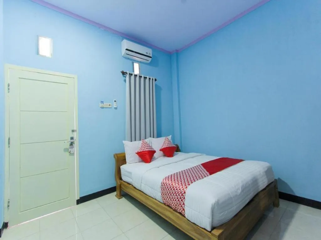 Bed in Hotel O Asipra House