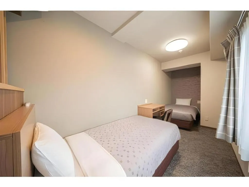 Bed in Kyoto Plaza Hotel Kyoto Station South