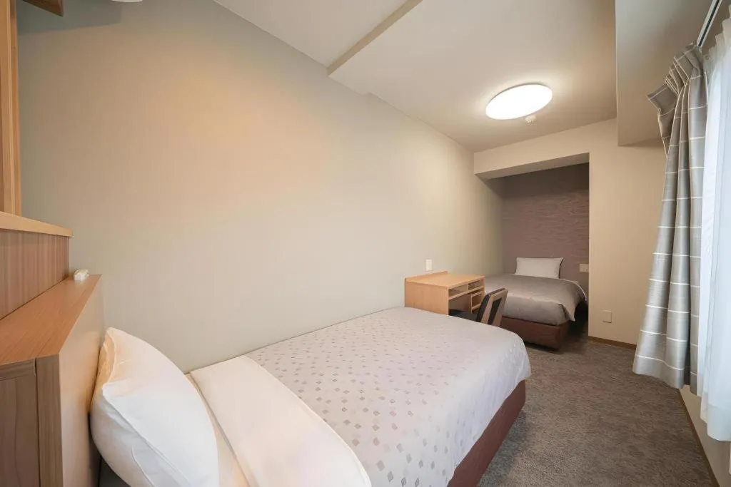 Bed in Kyoto Plaza Hotel Kyoto Station South