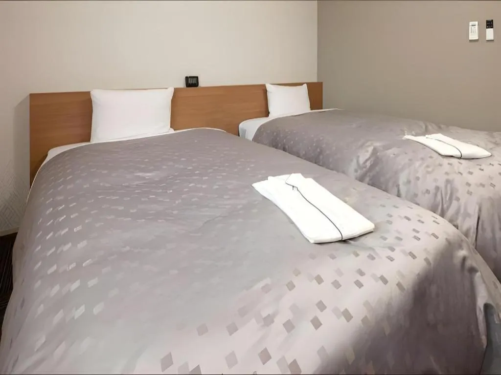 Bed in Kyoto Plaza Hotel Kyoto Station South