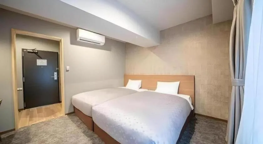 Bed in Kyoto Plaza Hotel Kyoto Station South