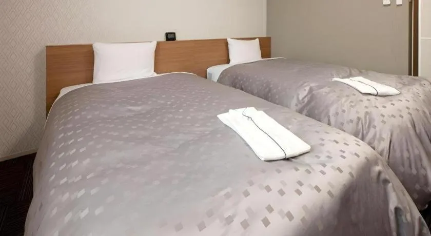 Bed in Kyoto Plaza Hotel Kyoto Station South