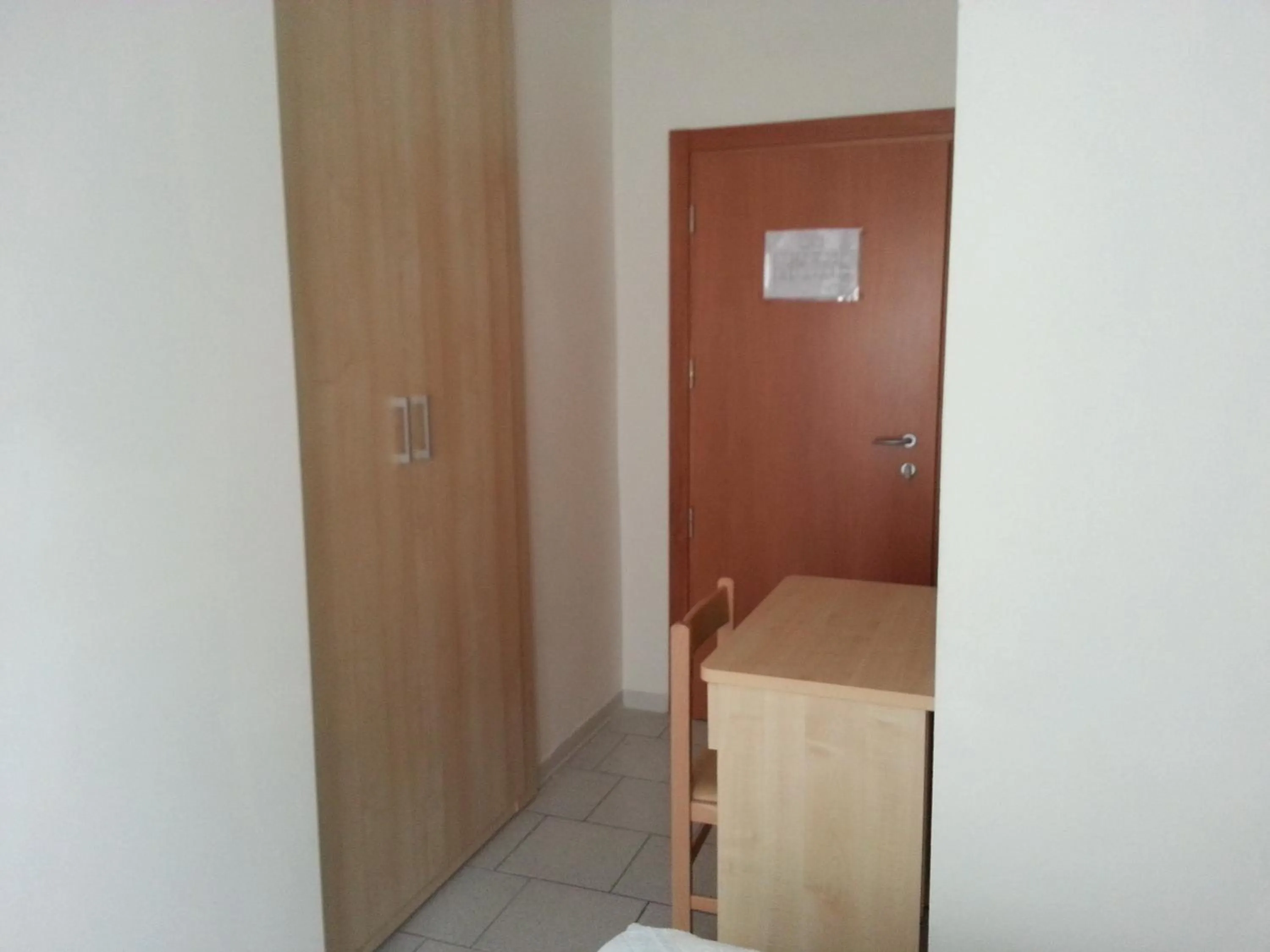 Bedroom in Hotel La Parigina