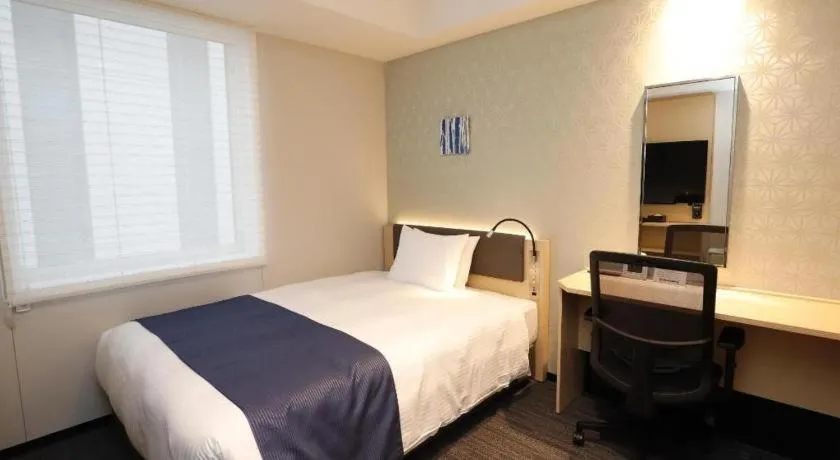 Bed in KEIKYU EX INN Haneda Innovation City 2 minutes walk from HICity Exit of Tenkubashi Station