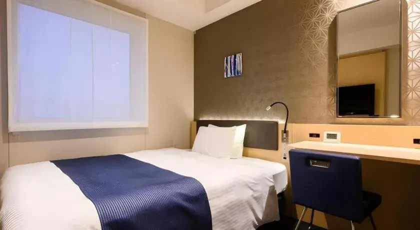 Bed in KEIKYU EX INN Haneda Innovation City 2 minutes walk from HICity Exit of Tenkubashi Station Bed in KEIKYU EX INN Haneda Innovation City 2 minutes walk from HICity Exit of Tenkubashi Station