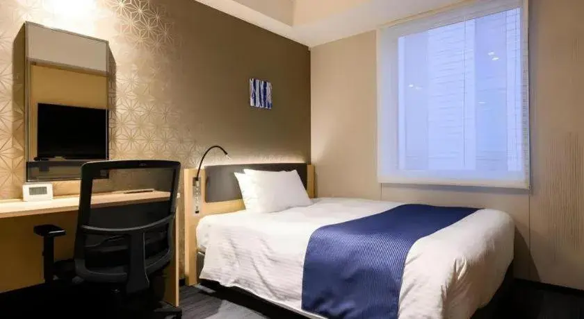 Bed in KEIKYU EX INN Haneda Innovation City 2 minutes walk from HICity Exit of Tenkubashi Station Bed in KEIKYU EX INN Haneda Innovation City 2 minutes walk from HICity Exit of Tenkubashi Station