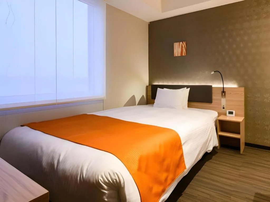 Bed in KEIKYU EX INN Haneda Innovation City 2 minutes walk from HICity Exit of Tenkubashi Station