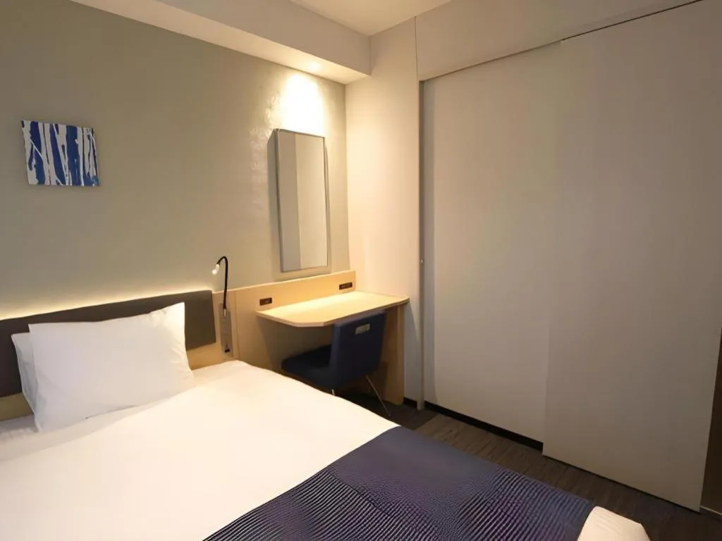 Bed in KEIKYU EX INN Haneda Innovation City 2 minutes walk from HICity Exit of Tenkubashi Station
