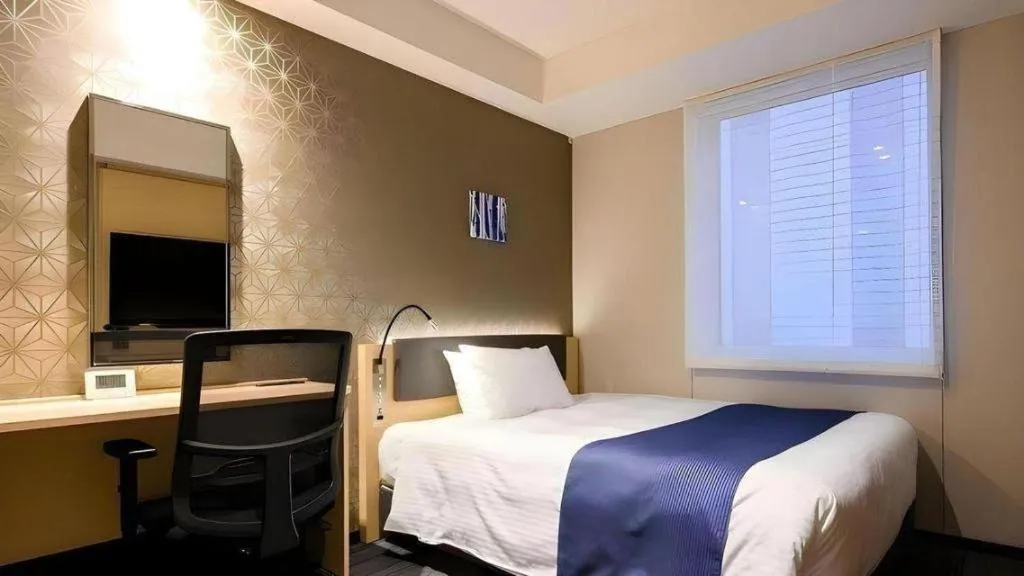 Bed in KEIKYU EX INN Haneda Innovation City 2 minutes walk from HICity Exit of Tenkubashi Station