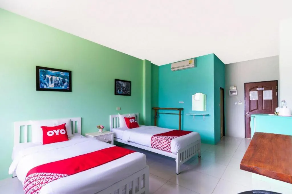 Bed in Thanagrit Apartelle