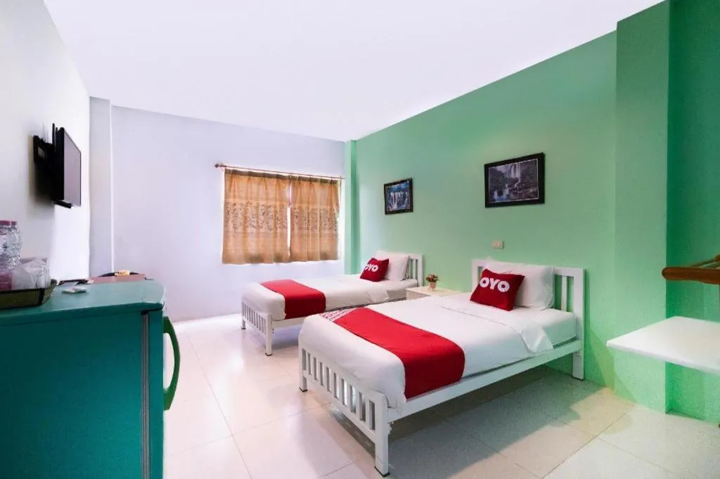 Bed in Thanagrit Apartelle