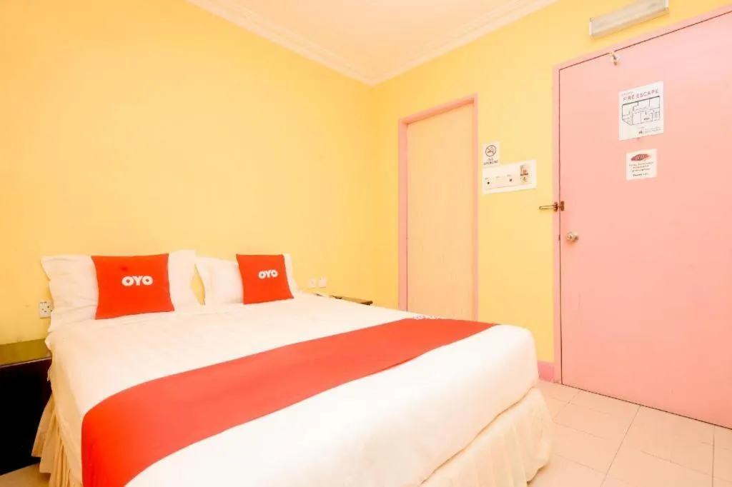 Bed in OYO 89958 Hotel Umimas