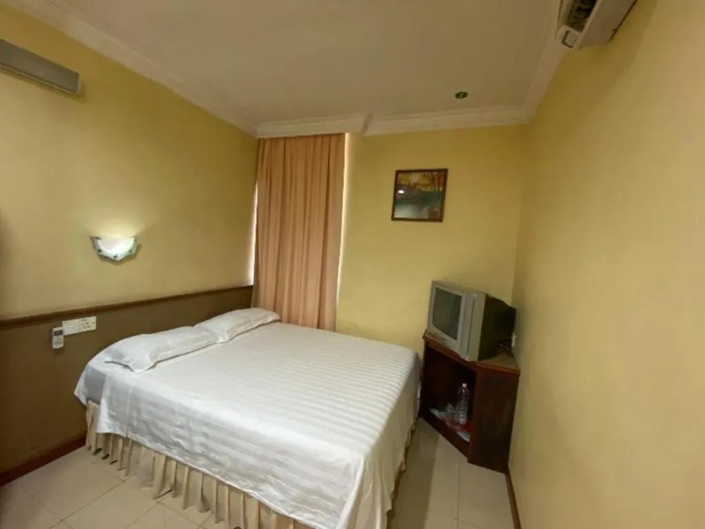 Bed in OYO 89958 Hotel Umimas