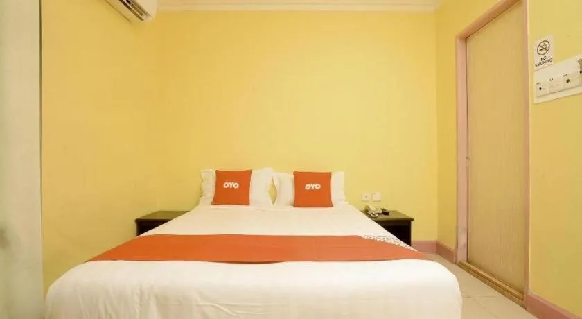 Bed in OYO 89958 Hotel Umimas