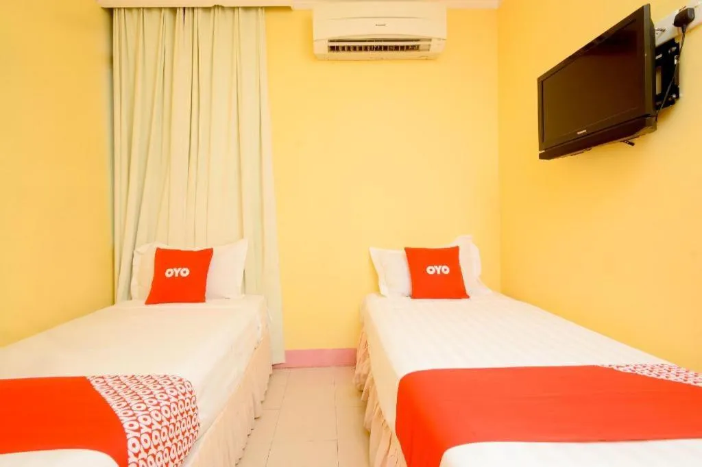 Bed in OYO 89958 Hotel Umimas