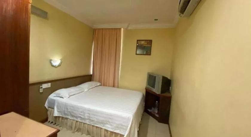 Bed in OYO 89958 Hotel Umimas