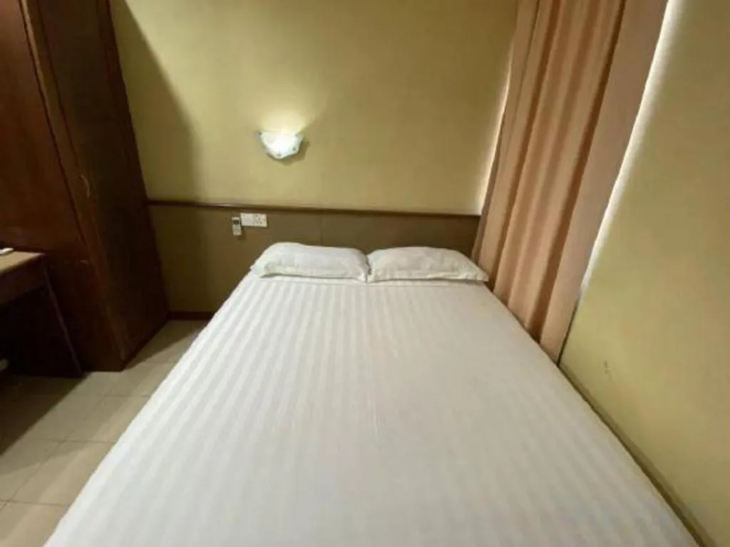 Bed in OYO 89958 Hotel Umimas