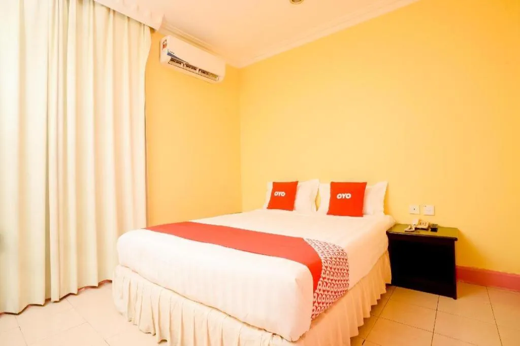 Bed in OYO 89958 Hotel Umimas