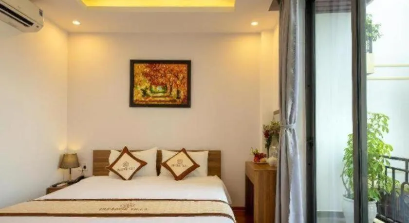 Bed in Hoi An Paradise Villa