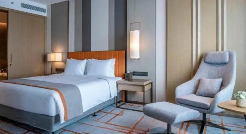 Bed in Hui Feng Wan Yun Hotel Hefei