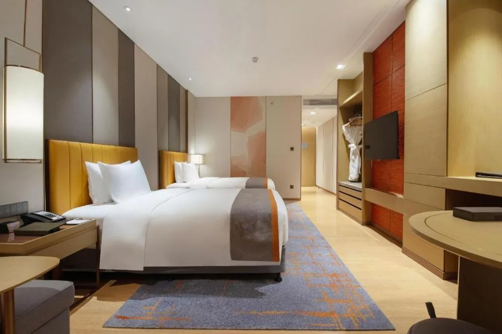 Bed in Hui Feng Wan Yun Hotel Hefei