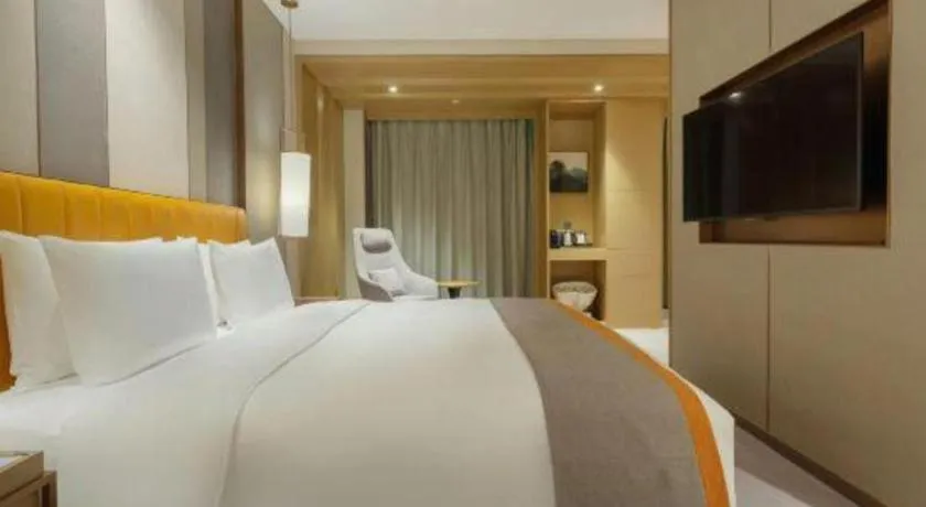 Bed in Hui Feng Wan Yun Hotel Hefei