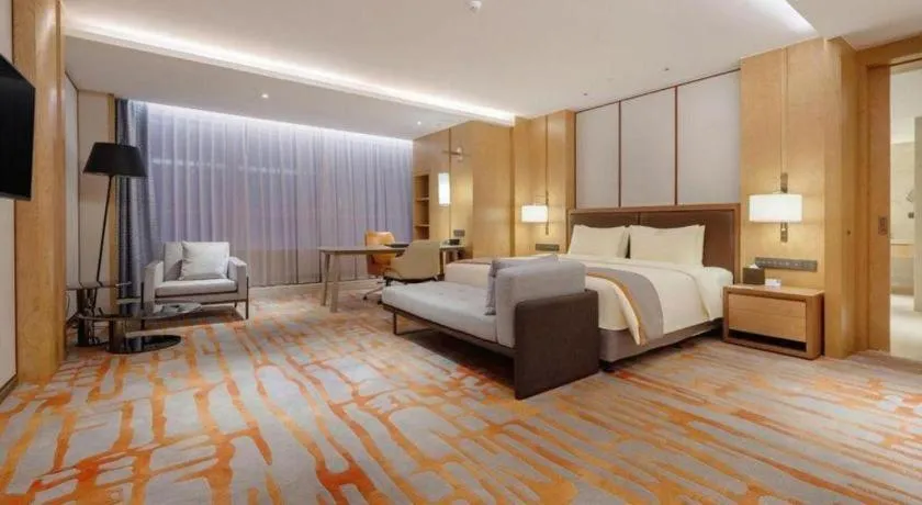 Bed in Hui Feng Wan Yun Hotel Hefei