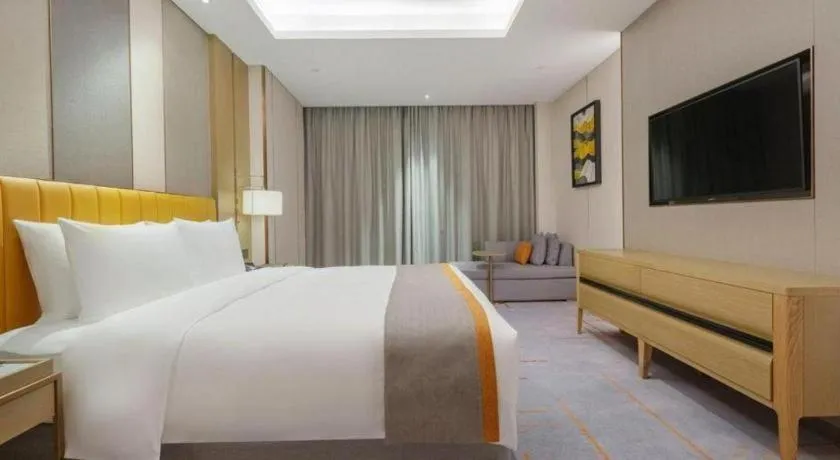 Bed in Hui Feng Wan Yun Hotel Hefei