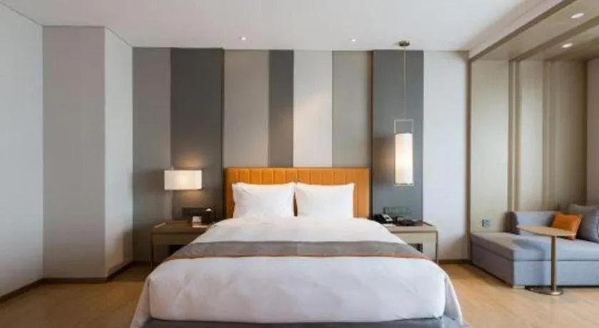 Bed in Hui Feng Wan Yun Hotel Hefei