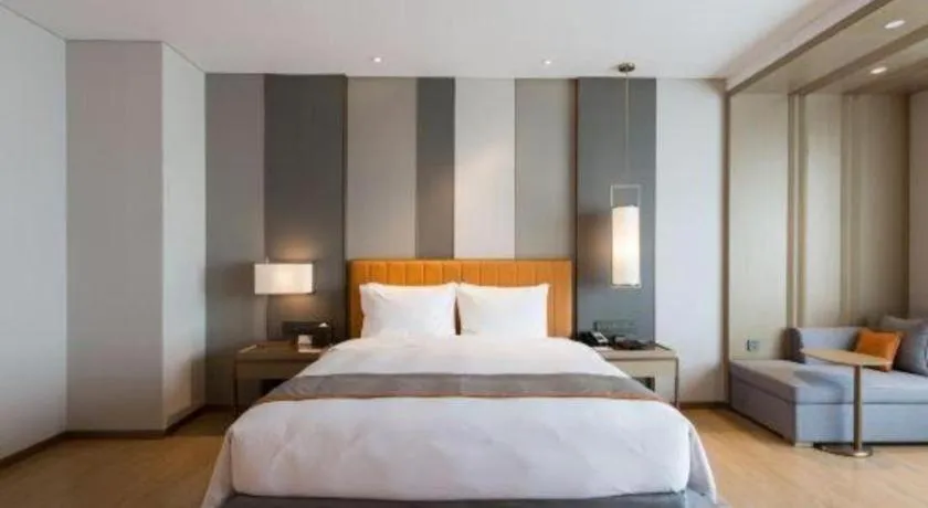 Bed in Hui Feng Wan Yun Hotel Hefei