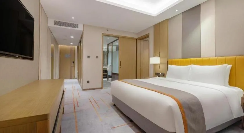 Bed in Hui Feng Wan Yun Hotel Hefei