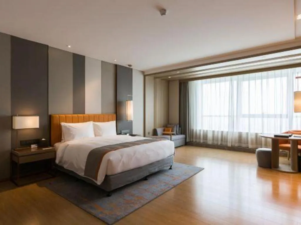 Bed in Hui Feng Wan Yun Hotel Hefei